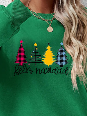 Green crewneck sweatshirt with Feliz Navidad graphic and Christmas trees.