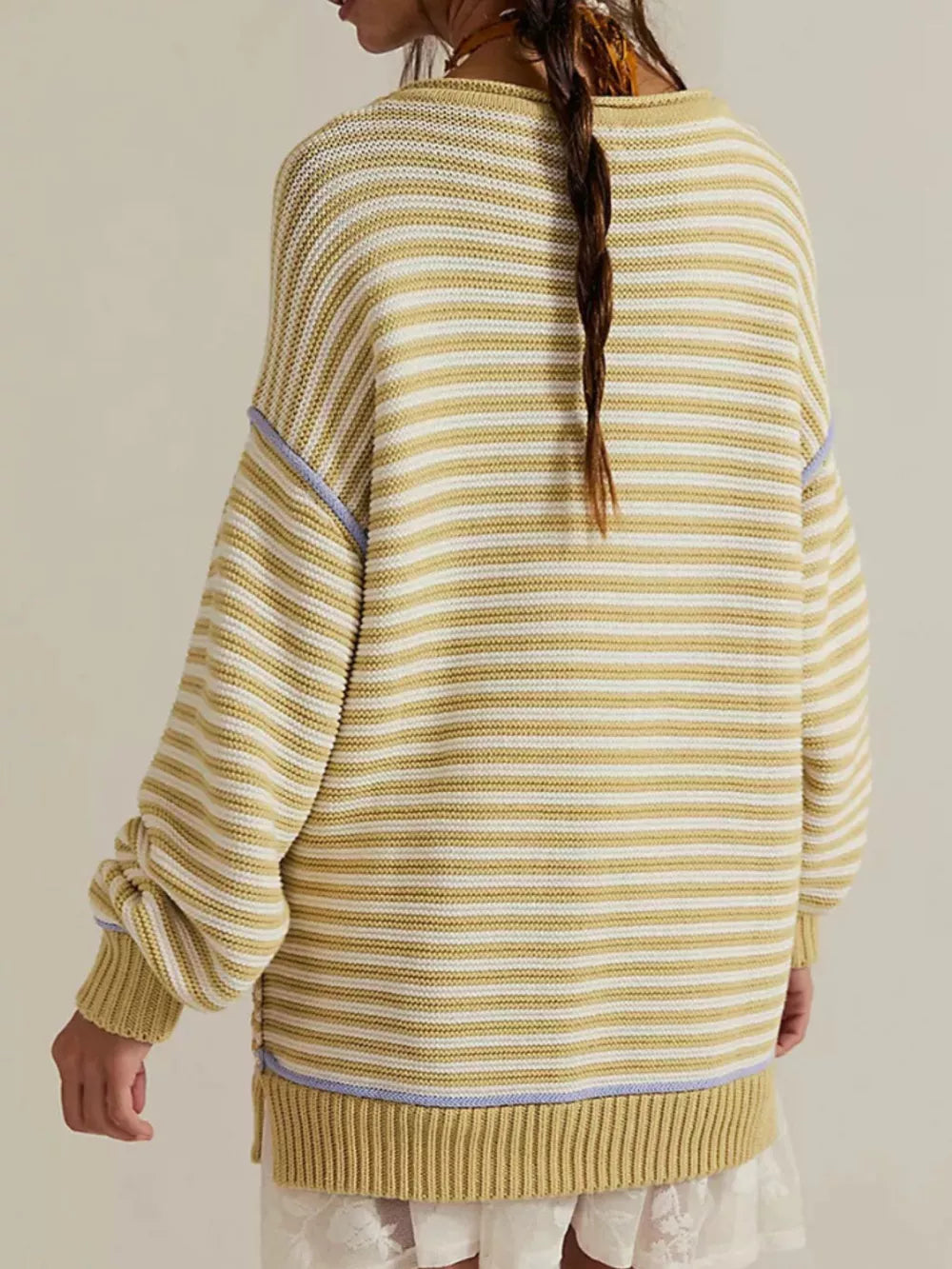 ivory pullover sweater featuring ribbed and striped
