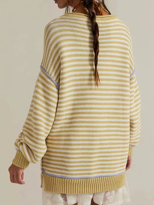 ivory pullover sweater featuring ribbed and striped