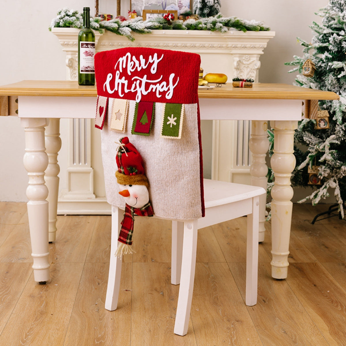Red Christmas chair cover with white "Merry Christmas" text and a snowman applique.