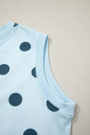 Polka dot two-piece set in pastel blue with crew neck and skort.