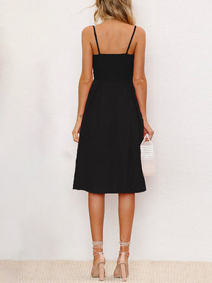 Black midi sundress with spaghetti straps and button detail