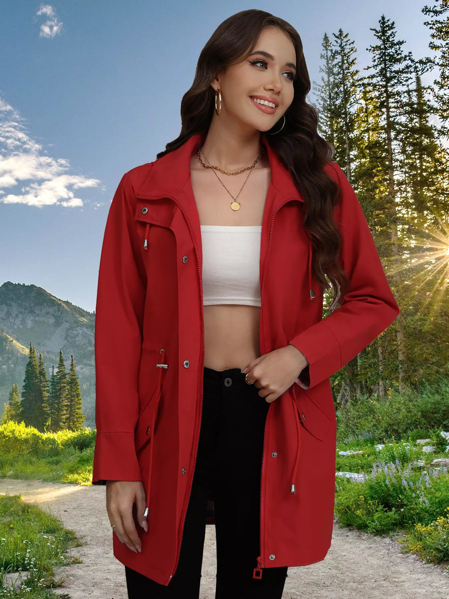 Red drawstring snap-down trench coat with snap details and adjustable waist.