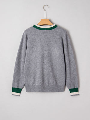 ivory pullover sweater with ribbed cuffs and long sleeve