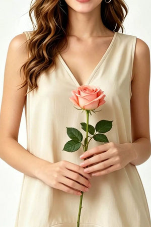 Beige V-neck mini dress with tiered ruffle hem, sleeveless, cotton fabric.