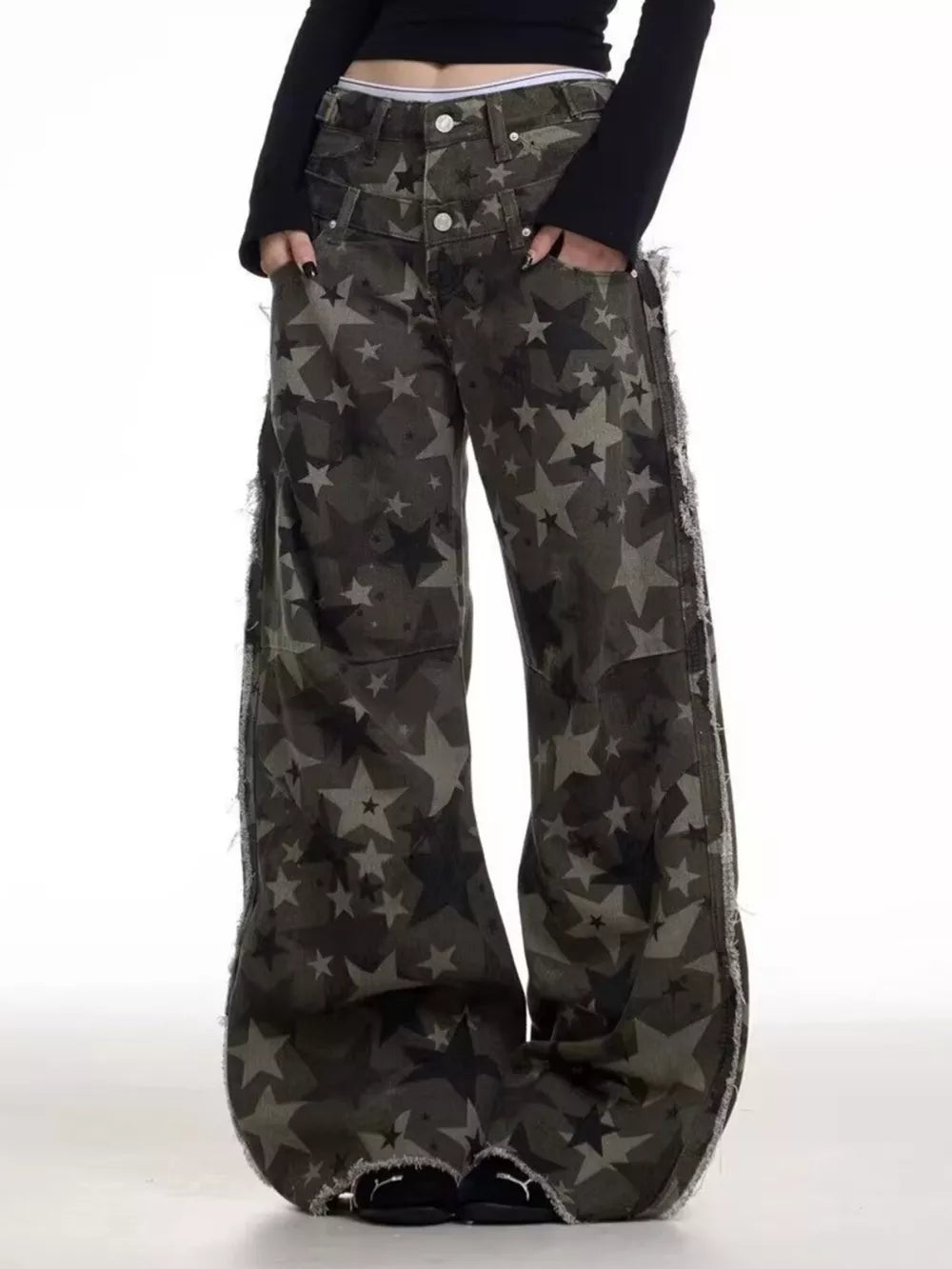 Star-embellished distressed wide-leg jeans in dark grey cotton with raw hems.