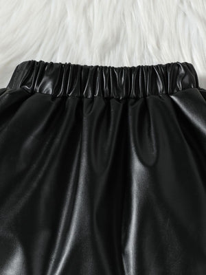 Black faux leather toddler shorts with elastic waistband detail