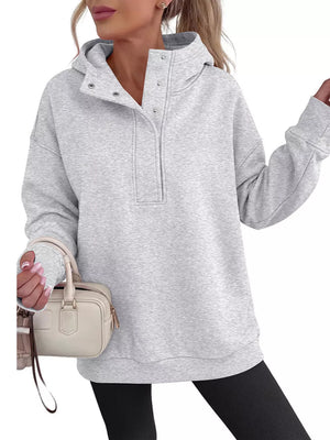 pullover hoodie in light grey featuring dropped shoulder and relaxed fit