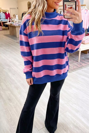 royal blue sweatshirt featuring ribbed cuffs and striped