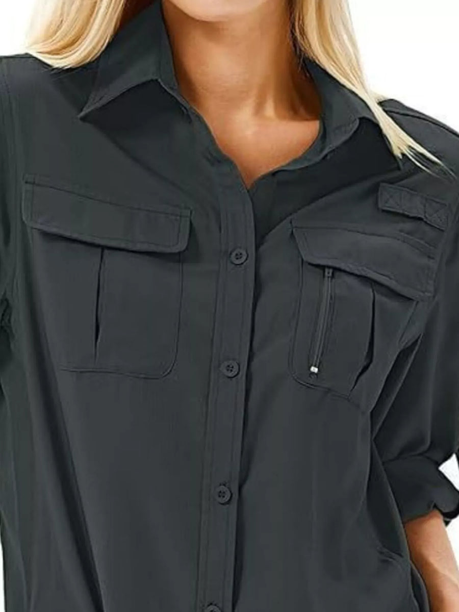Roll-up sleeve button up shirt in black with chest pockets and a zippered pocket detail.
