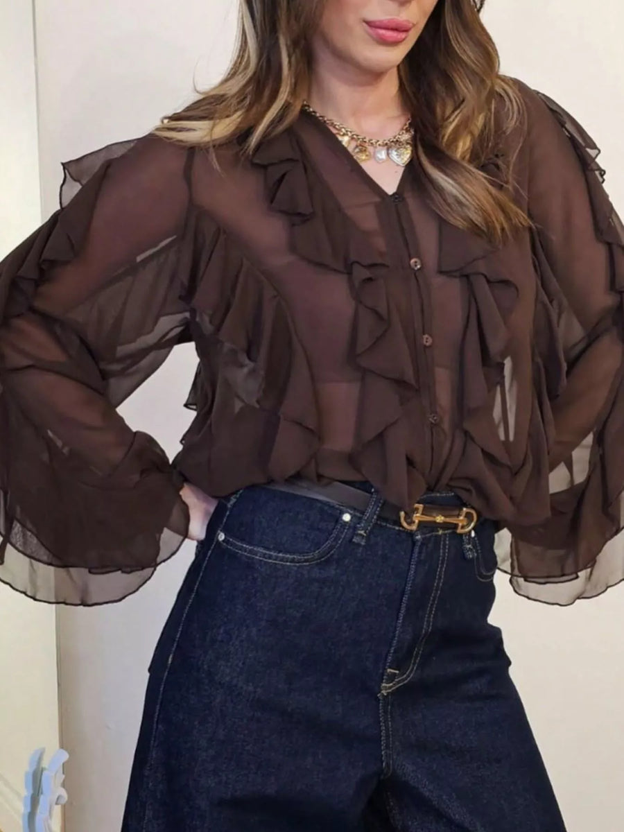 Brown sheer long-sleeve blouse with ruffles and v-neck.