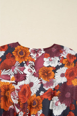 Floral wrap mini dress with puff sleeves in autumnal floral print.