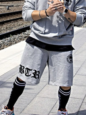 Gray Gothic Script Graphic Shorts with BTR logo and skull graphic detail.