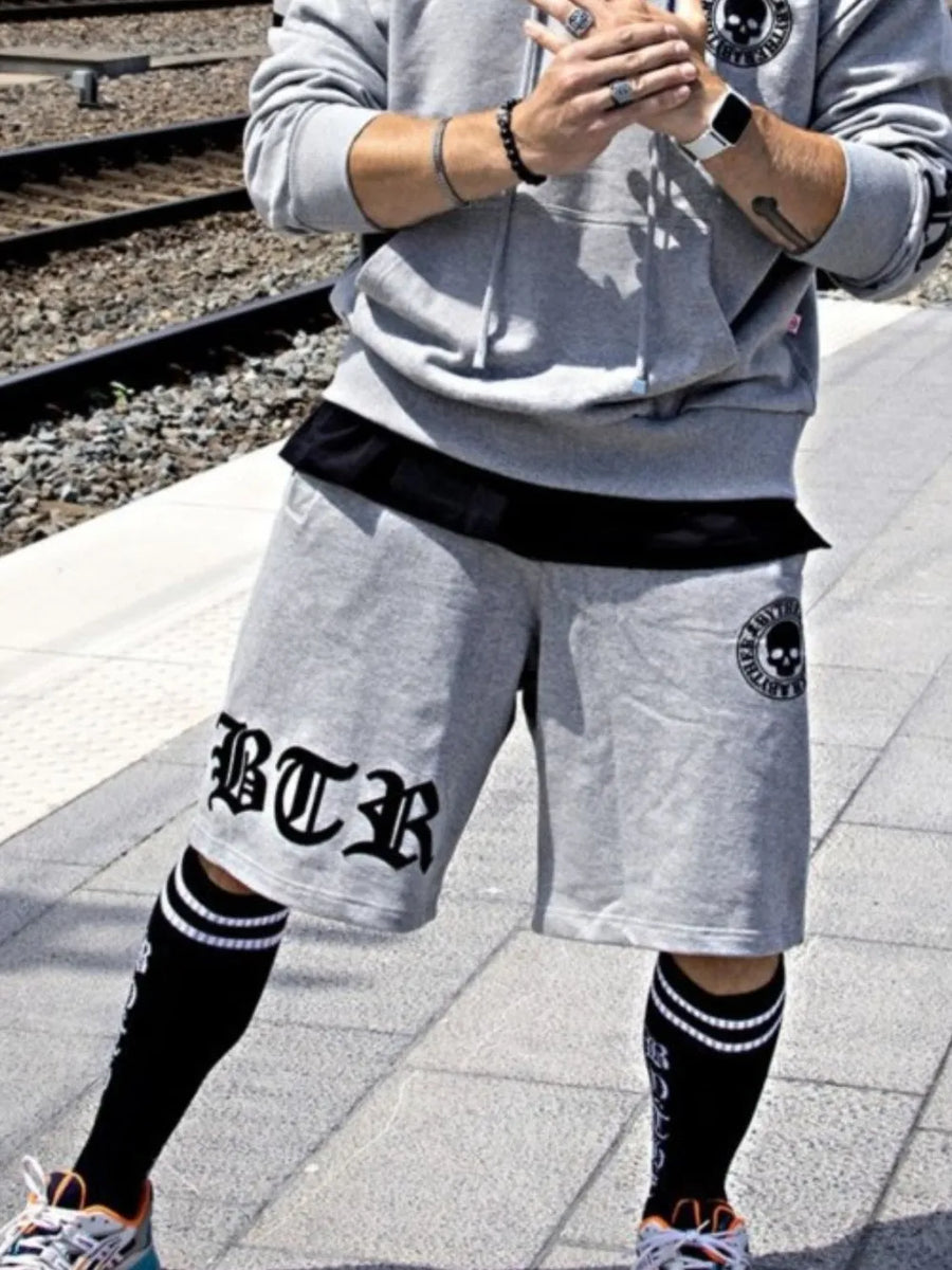 Gray Gothic Script Graphic Shorts with BTR logo and skull graphic detail.