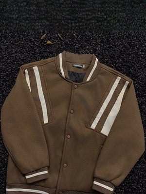 Brown bomber jacket with white stripe details on sleeves and collar, buttoned front.