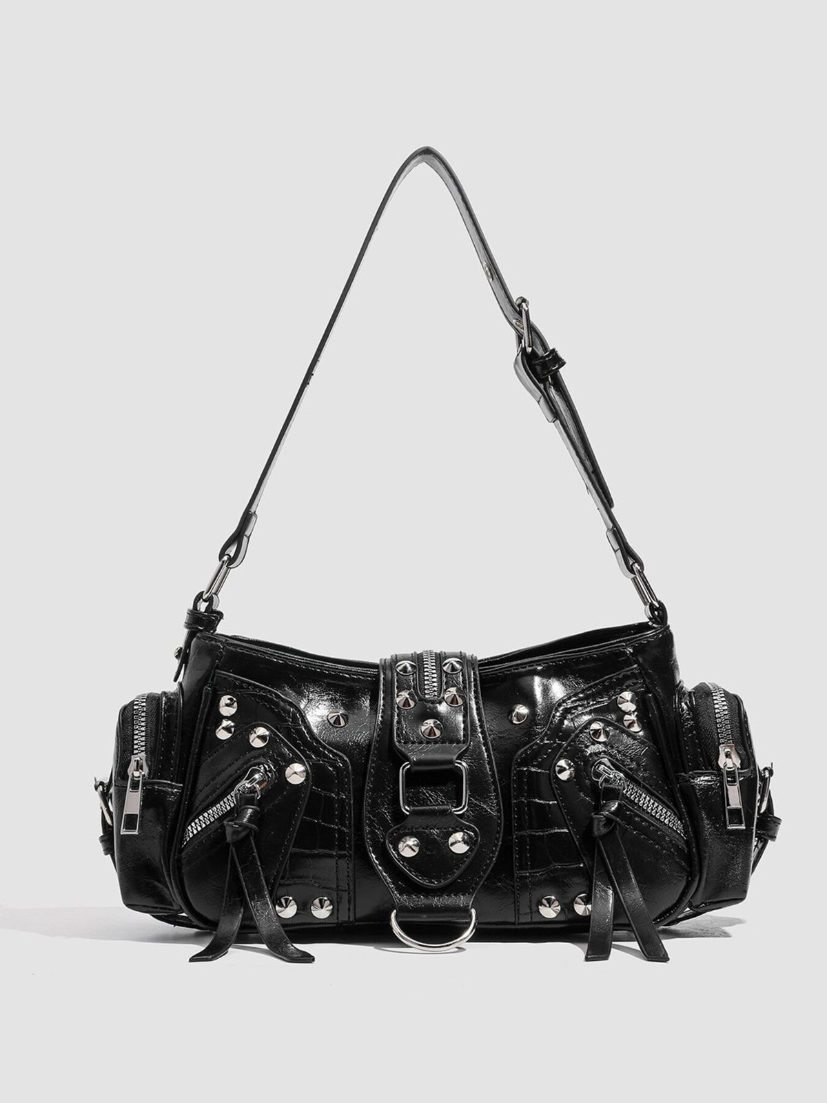 shoulder bag in black featuring rivet embellishment and structured fit