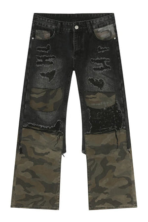 Distressed wide-leg jeans in dark denim with camouflage panels and rips.