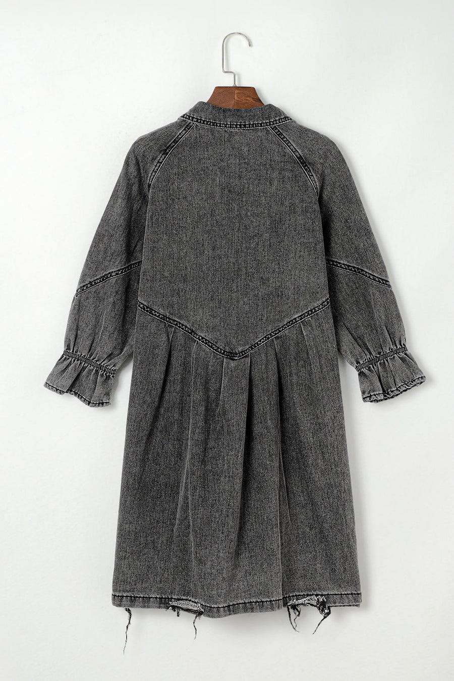 Gray denim shirtdress with ruffled cuffs and frayed hem.