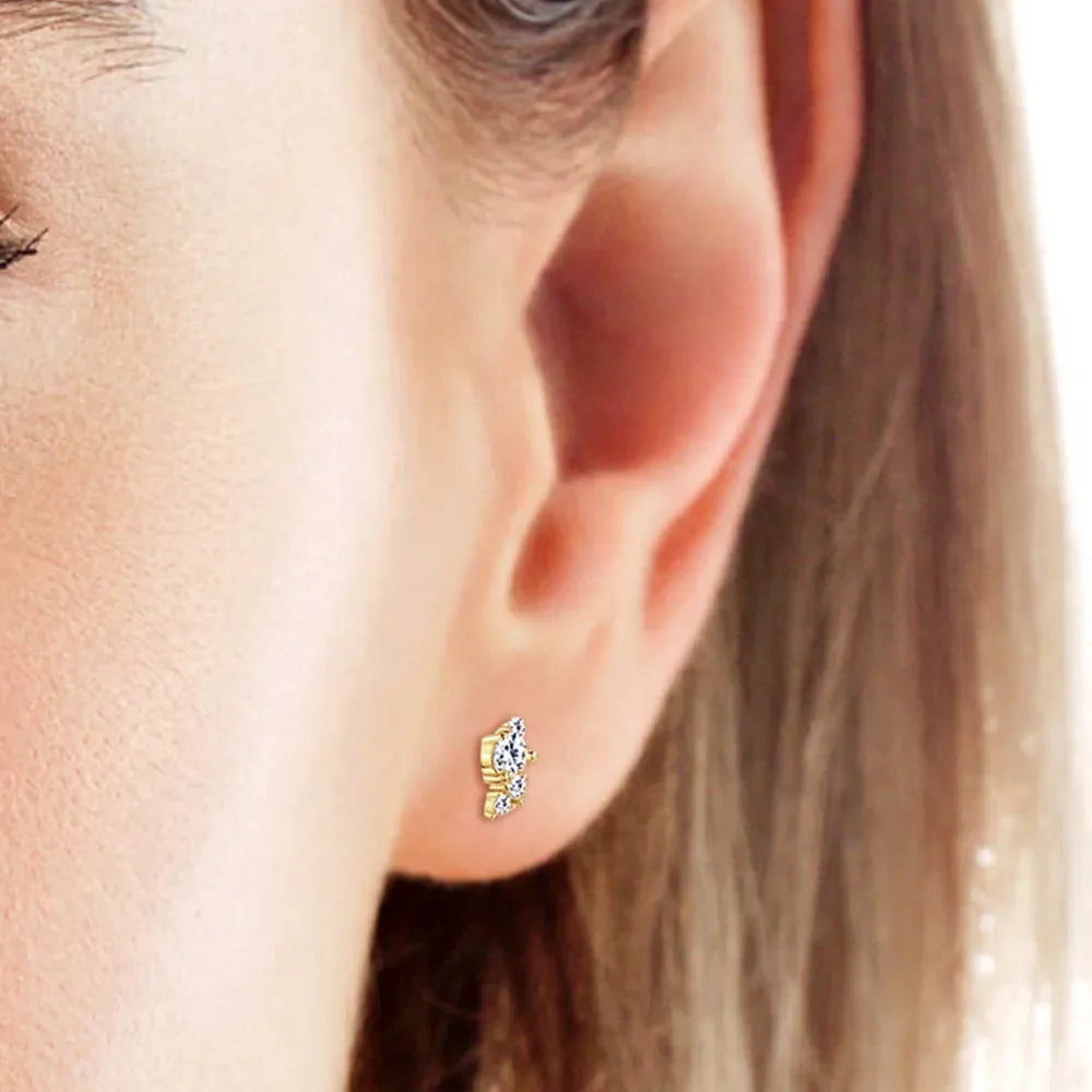 Gold diamond stud earrings with celestial cluster design