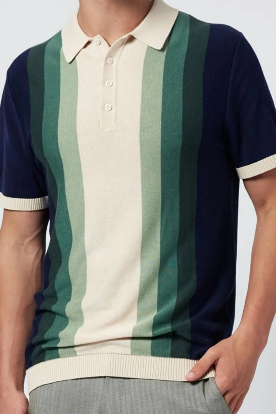 Gradient stripe knit polo shirt with cream, green, and navy vertical stripes.