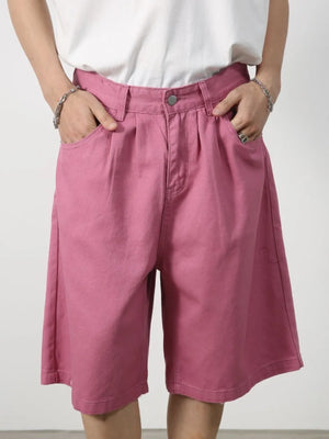Pleated Bermuda shorts in Moonlit Mauve with a buttoned waist and wide leg.