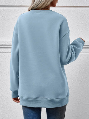 Misty Blue polyester drop shoulder sweatshirt with crewneck and ribbed cuffs and hem.