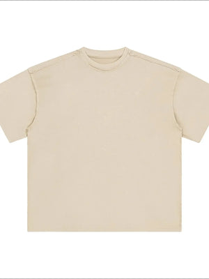 Beige washed cotton t-shirt with raw seams and crew neck.