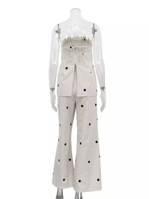 White polka dot strapless top and wide leg pants set with smocked bodice detail