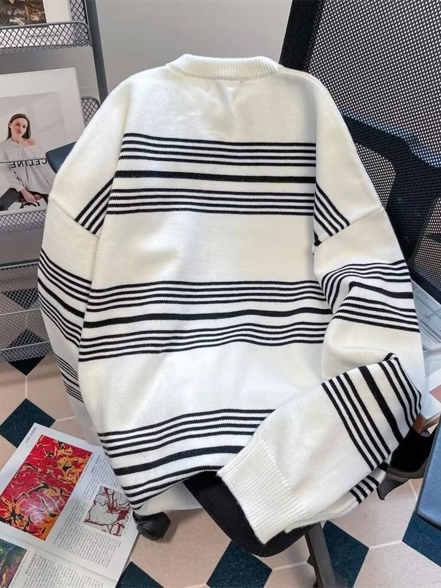 Men's white knit sweater with black horizontal stripes and a round neck.