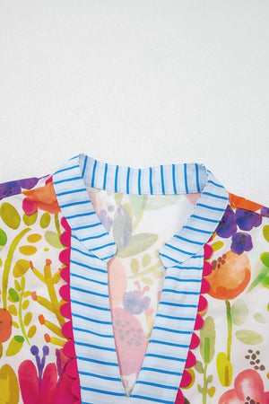 Vibrant floral cotton mini dress with blue striped trim and pink scalloped detail at neckline.
