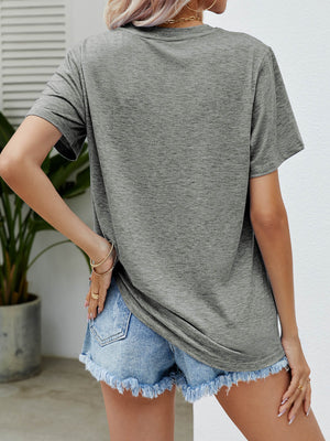 Heather Gray basic t-shirt with short sleeves and a crew neck, styled with denim shorts.