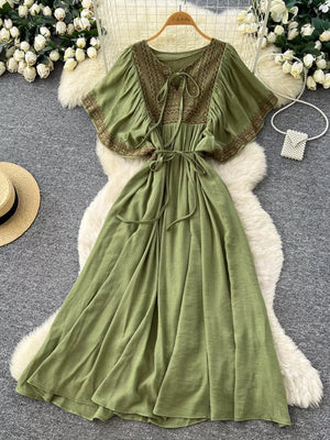 Mint green V-neck maxi dress with embroidered yoke and flutter sleeves
