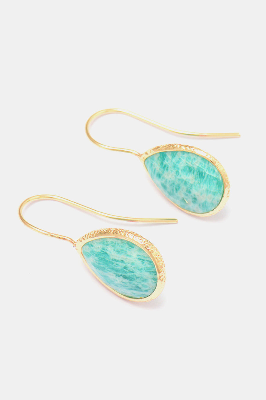 Textured aqua gemstone drop earrings with gold-tone setting and hook closure.
