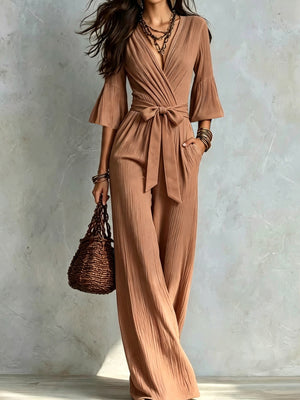 100% polyester Care instructions: Machine wash cold jumpsuit in White with wide-leg silhouette