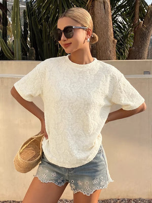 Textured paisley casual t-shirt in white with short sleeves and a crew neck.
