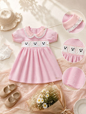 vintage-inspired A-line dress in white with peter pan collar