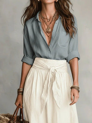 white relaxed shirt and skirt set with collared