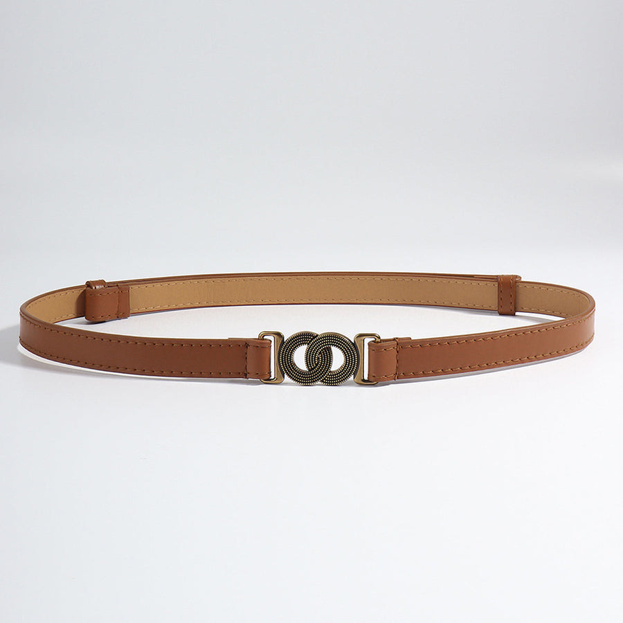 Brown vegan leather belt with interlocking bronze buckle detail