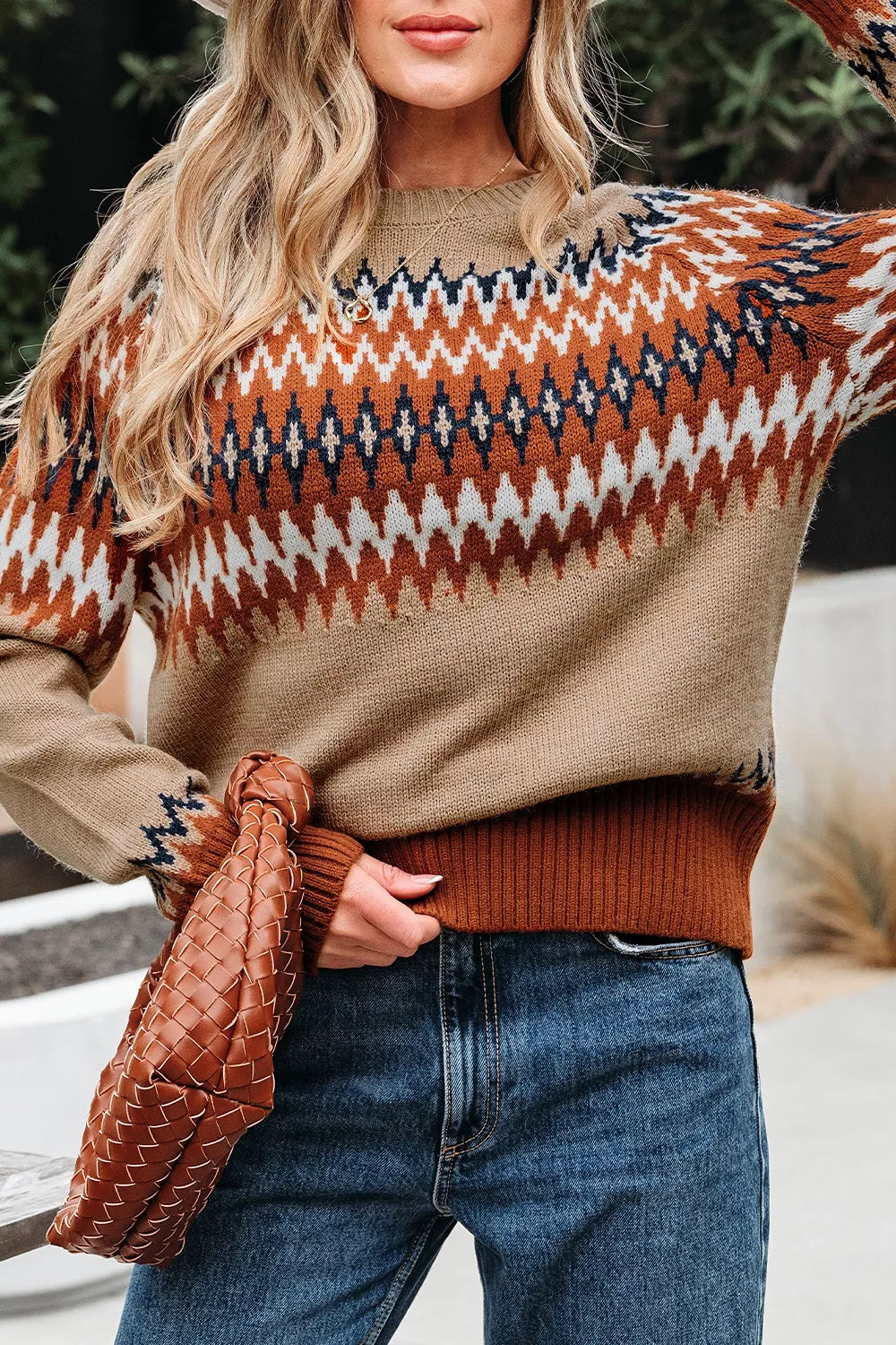 rust pullover sweater featuring ribbed cuffs and geometric