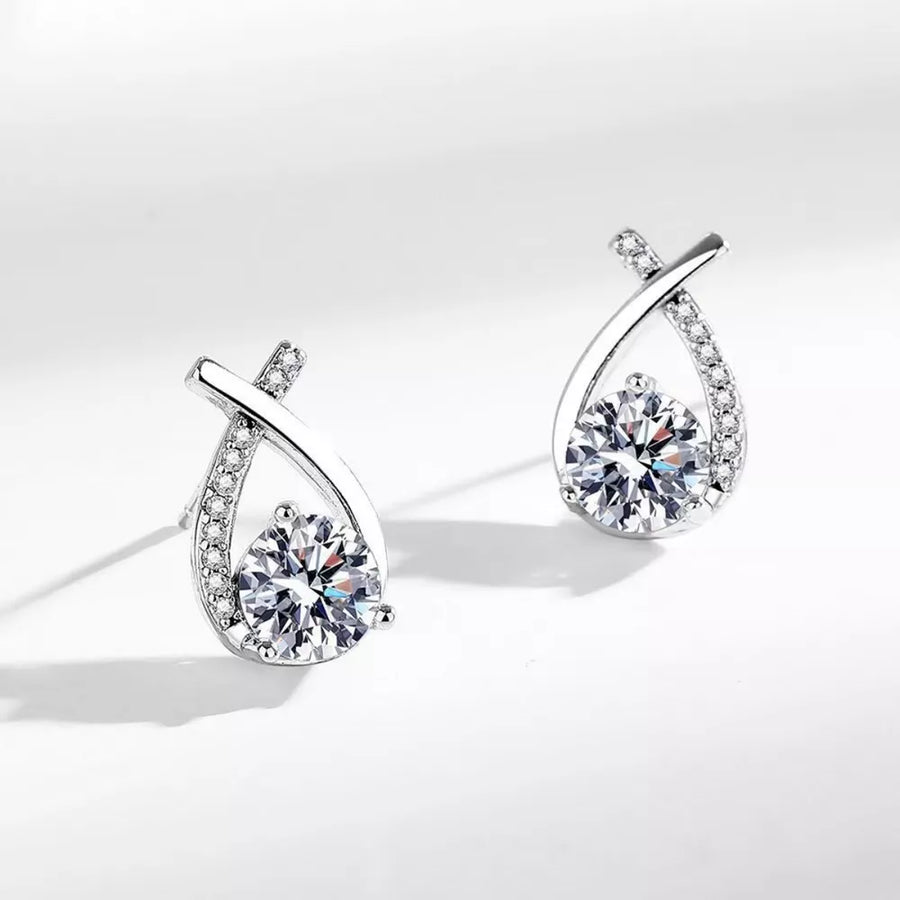 925 sterling silver,Moissanite Carat weight: 1ct Care instructions: Avoid wearin earrings in clear with abstract silhouette