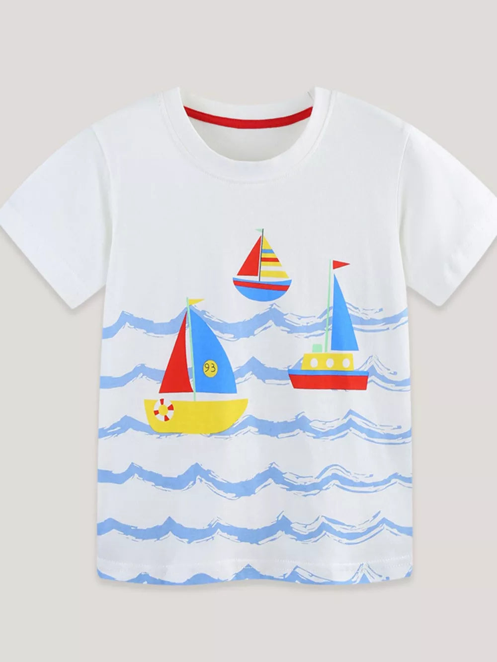 White cotton t-shirt with a nautical sailboat print and blue waves, red neckline trim.