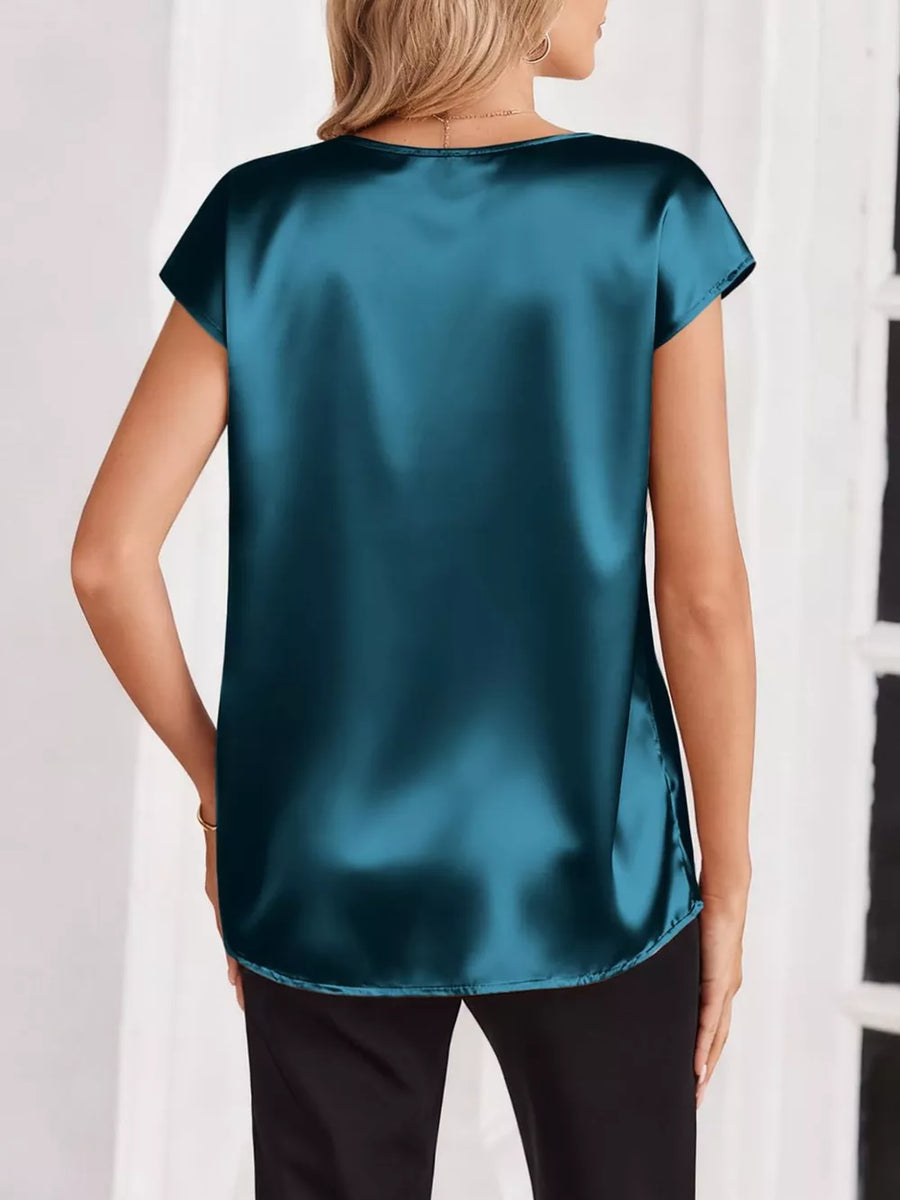 Lustrous satin V-neck blouse in blue with short sleeves and a relaxed fit.