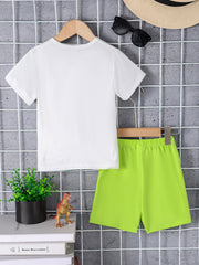 White crew neck t-shirt and lime green shorts ensemble with dinosaur detail.