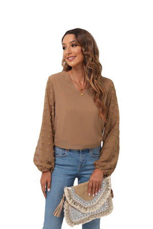 Camel V-neck blouse with sheer pom-pom detail balloon sleeves.