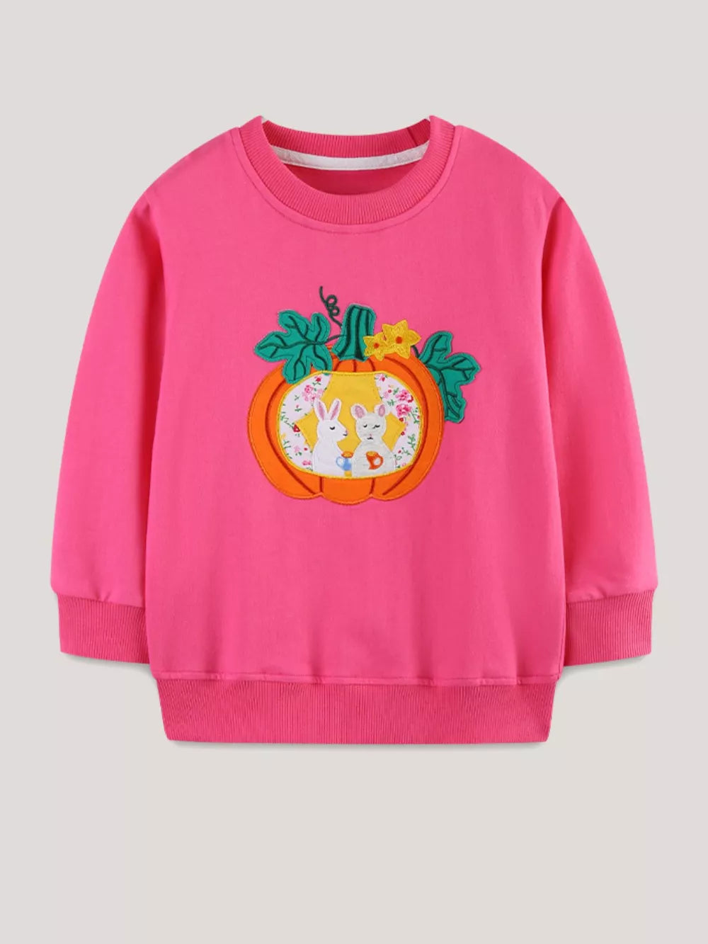 Pink cotton crew neck sweatshirt with pumpkin applique featuring two bunnies.