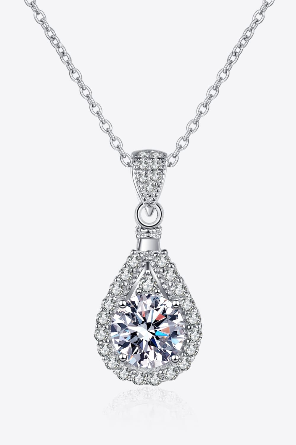 Silver teardrop moissanite necklace with halo detail on sterling silver chain.