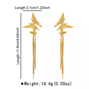 earrings in gold with dangle and long