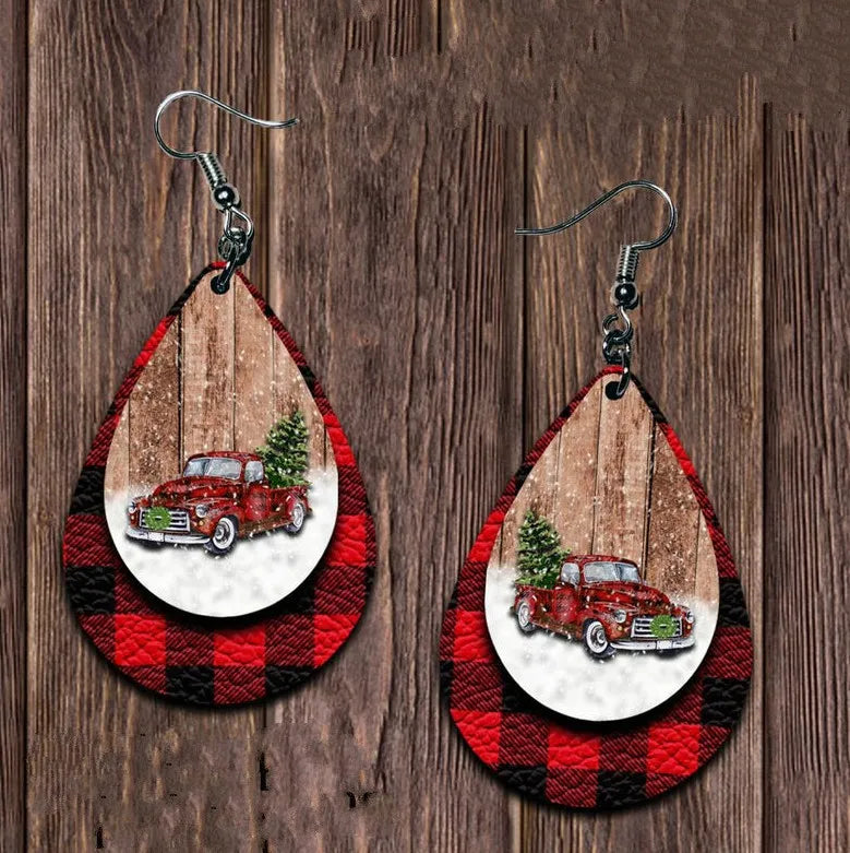 Festive plaid teardrop earrings with red truck and Christmas tree design