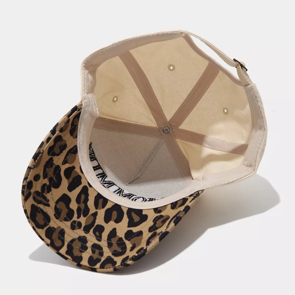 cap in tan with leopard-print and embroidered slogan