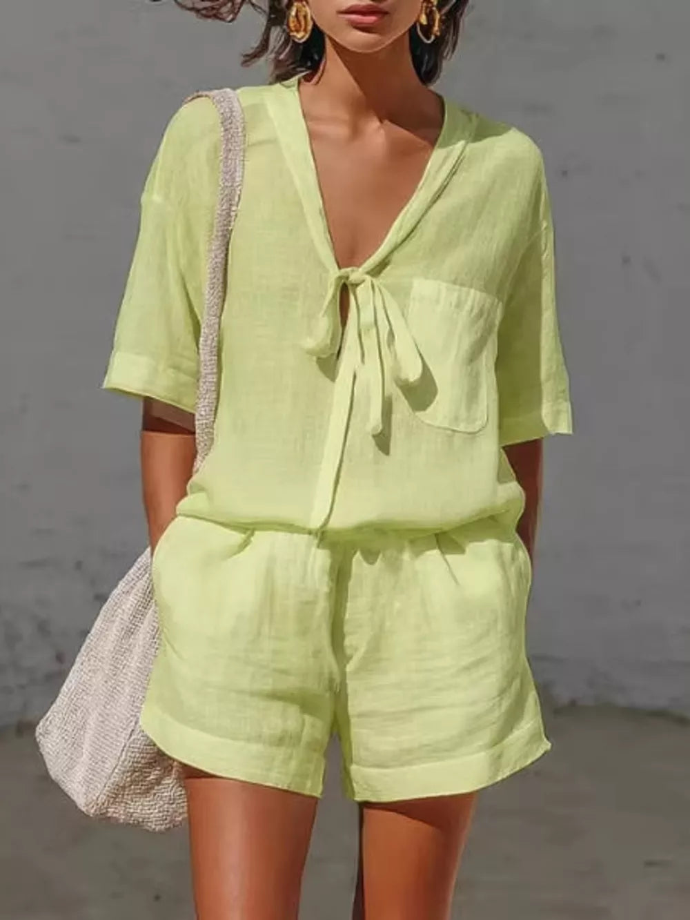 white matching set with thigh-length and tie